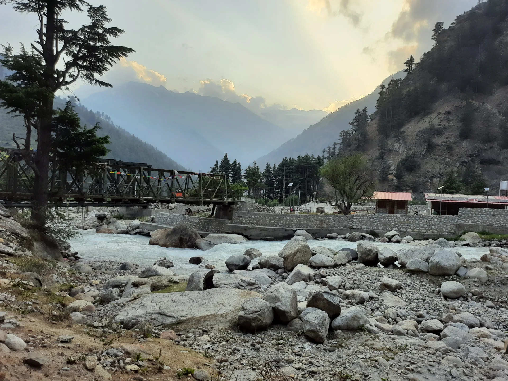 Bridge and rocky Bhagirathi riverbank near Harsil village.