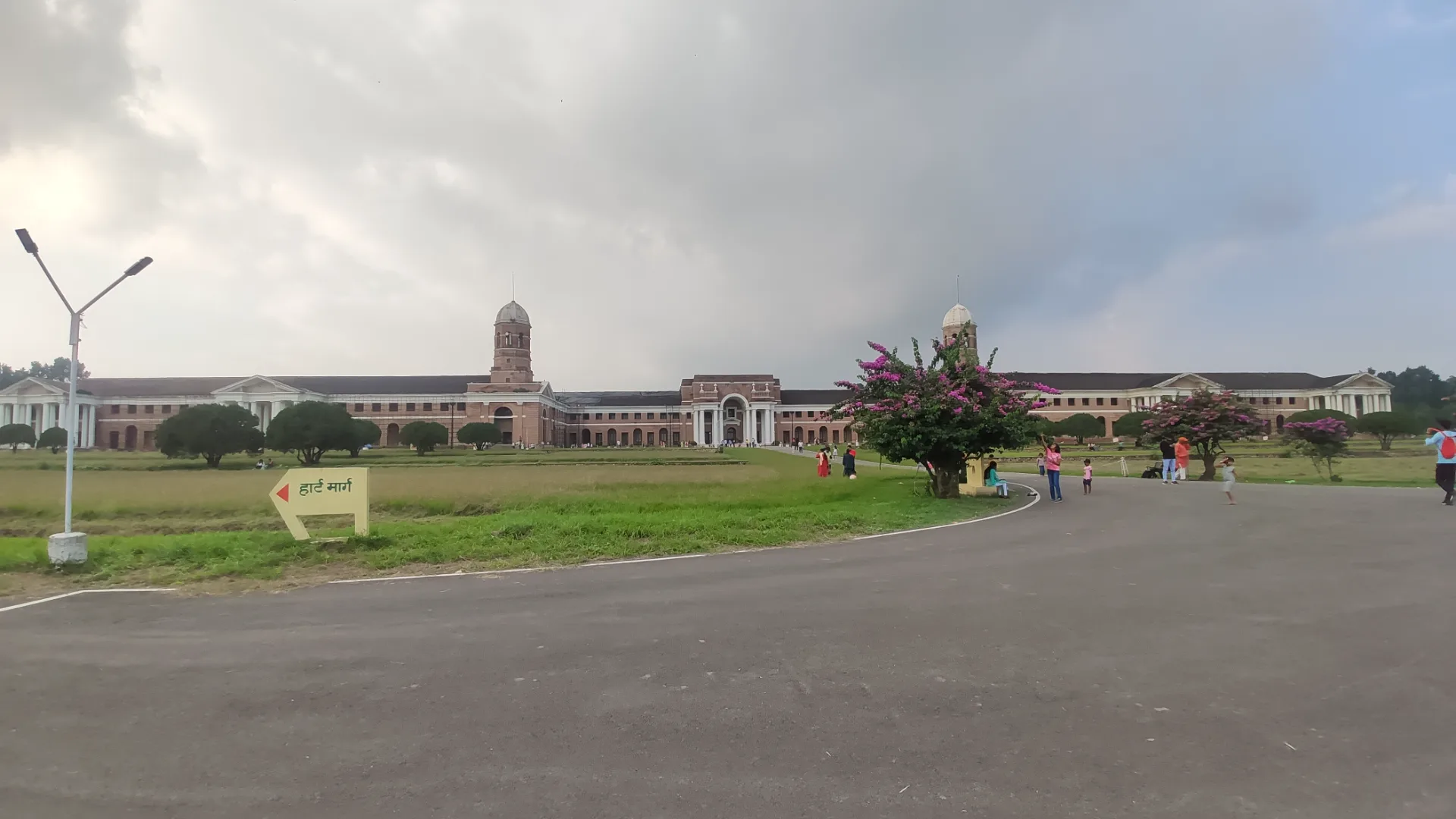 Front view of the Forest Research Institute building and grounds in Dehradun.
